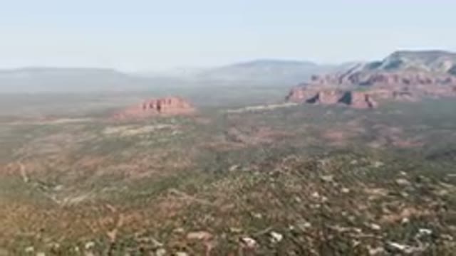SEDONA ARIZONA USA-2023: Aerial Valley With A Mountain In The Distance