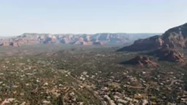 SEDONA ARIZONA USA-2023: Aerial City In The Mountains With A Valley Below