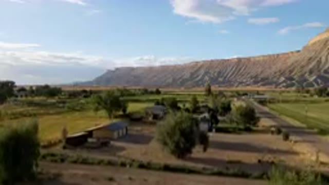 PALISADES COLORADO USA-2023: Mountains In The Distance With A Small Village In
