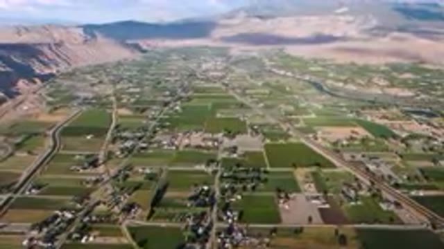 PALISADES COLORADO USA-2023: Aerial View of Valley with Road Through Green Valley