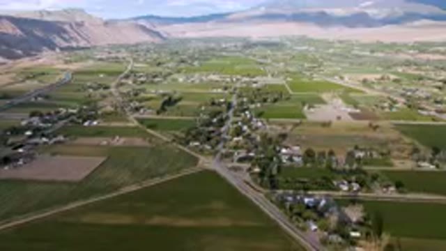 PALISADES COLORADO USA-2023: Aerial Small Town In A Valley With Mountains In The