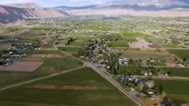PALISADES COLORADO USA-2023: Aerial Small Town Surrounded By Mountains And Fields