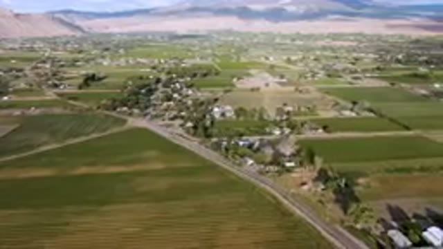 PALISADES COLORADO USA-2023: Aerial Farm And Town In The Distance