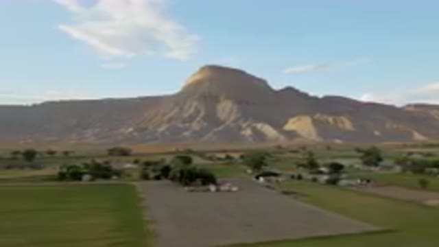 PALISADES COLORADO USA-2023: Mountains In The Distance With A Small Town In The