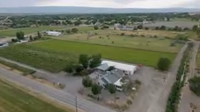 PALISADES COLORADO USA-2023: Aerial Farm With A Road And A Farm House