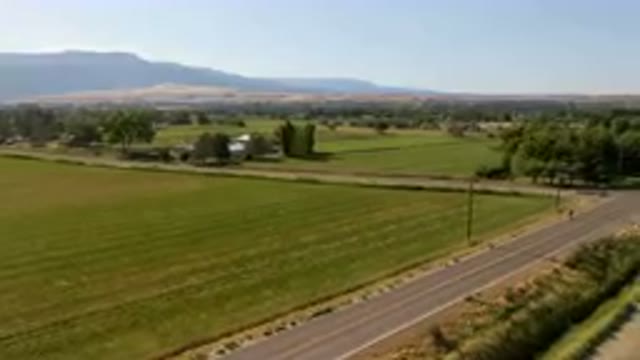 PALISADES COLORADO USA-2023: Rural Road With A Farm And A Road