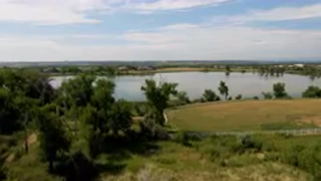 BROOMFIELD COLORADO USA-2023: Lake And A Field With Trees