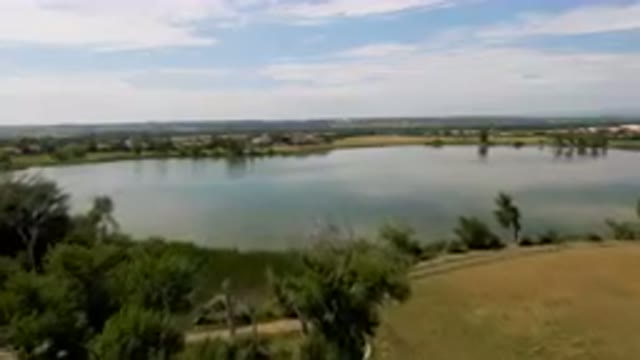 BROOMFIELD COLORADO USA-2023: Large Lake In The Middle Of A Field