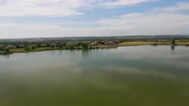 BROOMFIELD COLORADO USA-2023: Large Body Of Water With A Small Town In The Distance