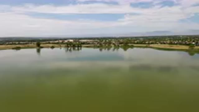 BROOMFIELD COLORADO USA-2023: Large Body Of Water With A Small Island In The Middle