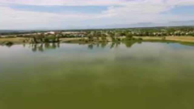 BROOMFIELD COLORADO USA-2023: Large Body Of Water With A Small Town In The Background