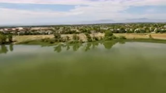 BROOMFIELD COLORADO USA-2023: Lake With A Small Town In The Distance