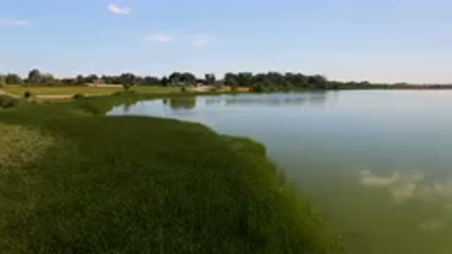 BROOMFIELD COLORADO USA-2023: Body Of Water With A Small Boat In It