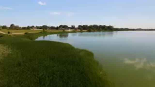 BROOMFIELD COLORADO USA-2023: Body Of Water With A Small Boat In It