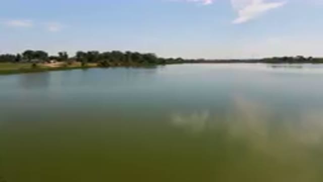 BROOMFIELD COLORADO USA-2023: Large Body Of Water With A Boat In It