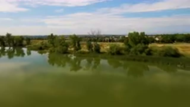BROOMFIELD COLORADO USA-2023: Aerial Park With A Pond And A Dirt Track
