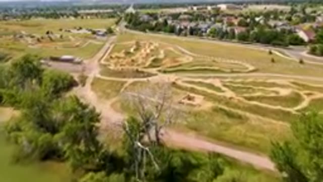 BROOMFIELD COLORADO USA-2023: Aerial Dirt Track In A Park With A Pond