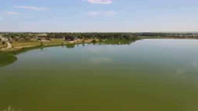 BROOMFIELD COLORADO USA-2023: Large Body Of Water With A Small Island In The Middle