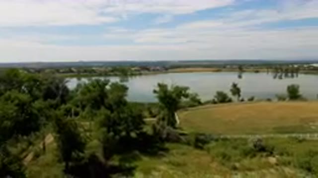 BROOMFIELD COLORADO USA-2023: Lake And A Field With Trees