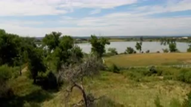 BROOMFIELD COLORADO USA-2023: Lake And A Field From A Hill
