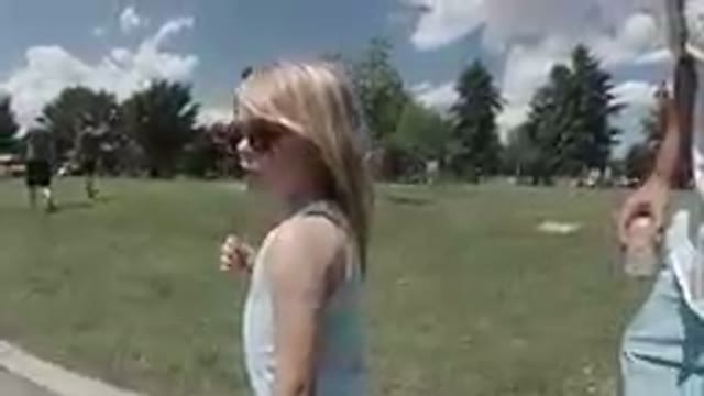 Denver, Colorado- 2019, Sept. 23- Little Girl Walking In Suburban Park