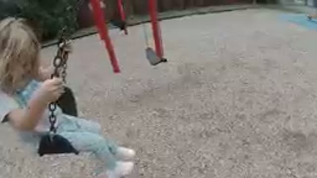 Denver, Colorado-2019, Sept. 24- Little Girl Swinging On A Swing
