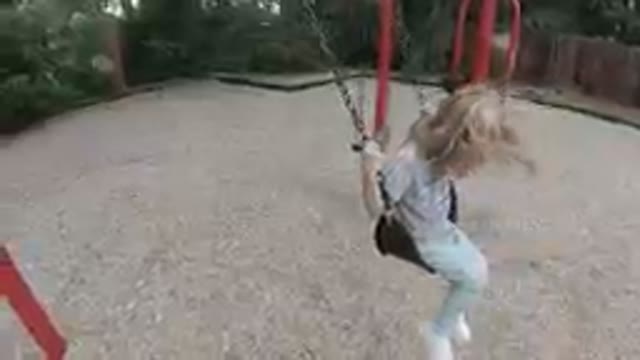 Denver, Colorado-2019, Sept. 24-Little Girl Swinging