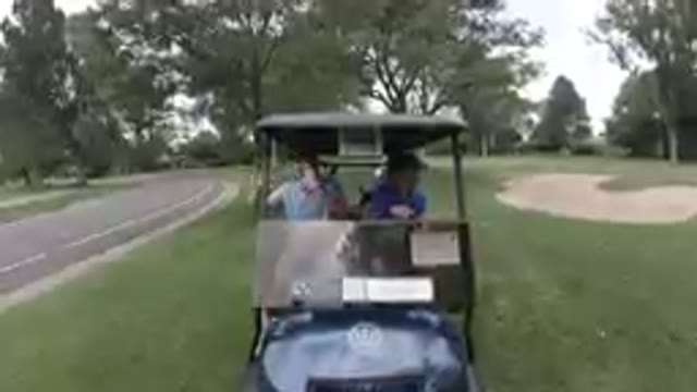 COLORADO, UNITED STATES-2019: Friends Riding A Golf Cart
