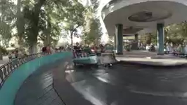 Colorado United States-2019: Mom Waving Hi While Riding Carousel