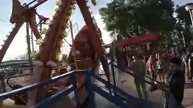 Amusement Park: Children Riding Pirate Ship
