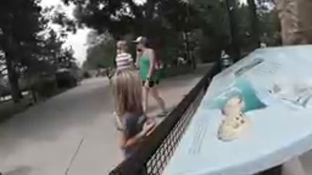 COLORADO UNITED STATES-2019: Children Viewing Educational Sign Along Park Path