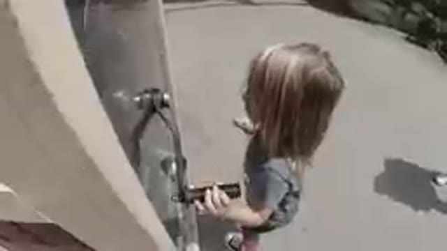 Denver, United States-2019: Little Girl Using Vintage Crank Machine