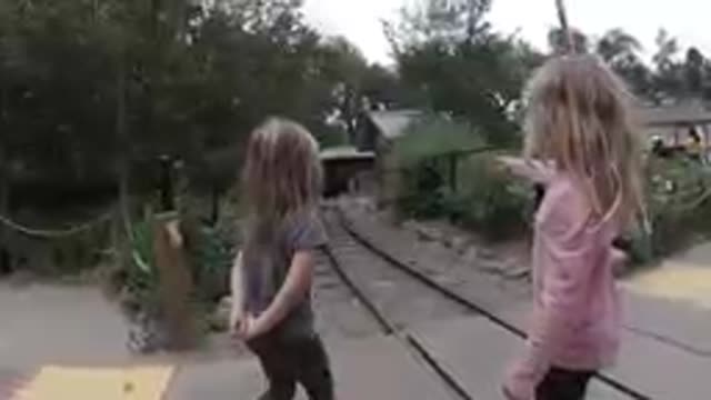 At the Zoo - Two Curious Little Girls