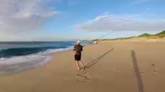 Los Cabos, Mexico-2019: Happy Man Preparing to Fish