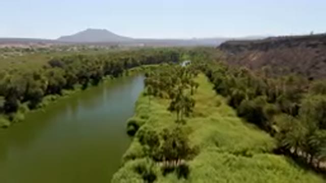 SAN IGNACIO BCS MEXICO-2023: River With A Mountain In The Background