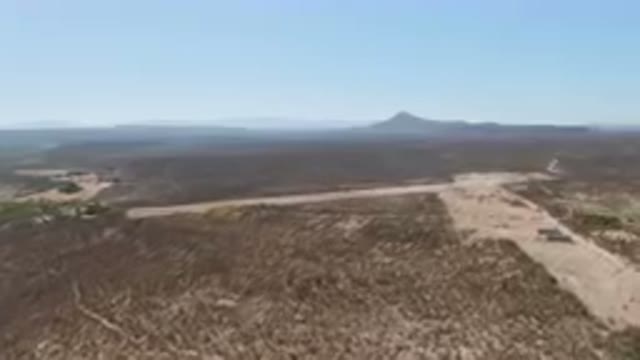 SAN IGNACIO BCS MEXICO-2023: Dirt Road In A Desert Area With Mountains In The