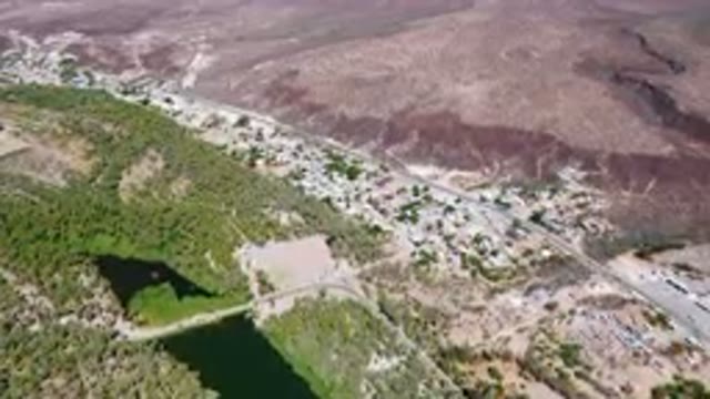 SAN IGNACIO BCS MEXICO-2023: Aerial View of Small Town With River and Road