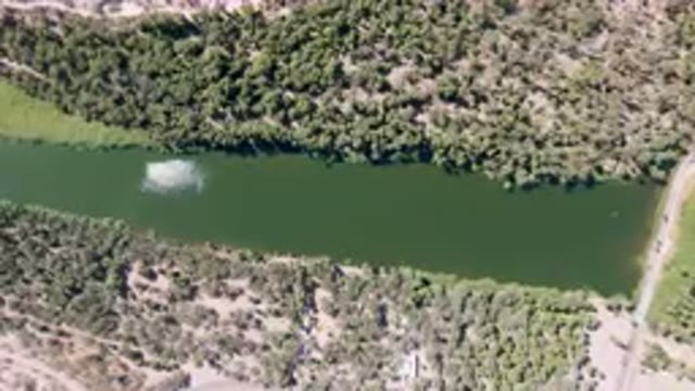 SAN IGNACIO BCS MEXICO-2023: Aerial River Running Through A Forest Filled With