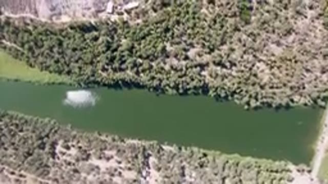 SAN IGNACIO BCS MEXICO-2023: Aerial River With A Small Boat In It