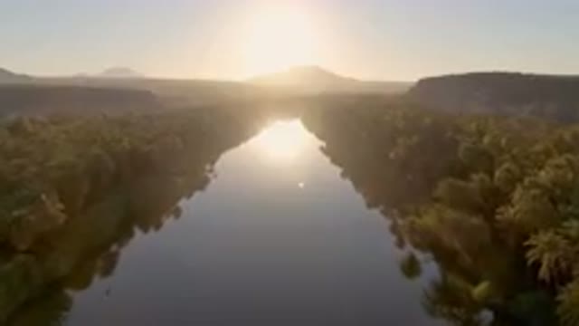 SAN IGNACIO BCS MEXICO-2023: River With Trees And Mountains In The Background