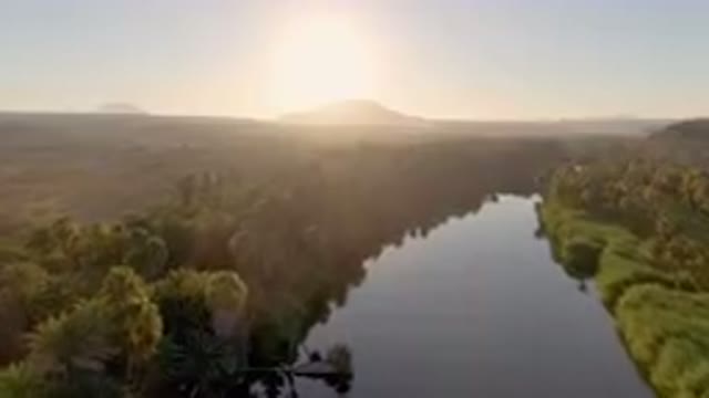 SAN IGNACIO BCS MEXICO-2023: River With Trees And Mountains In The Background