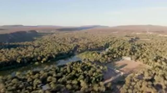 SAN IGNACIO BCS MEXICO-2023: Large Field With A River Running Through It
