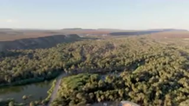 SAN IGNACIO BCS MEXICO-2023: Aerial River And A Forest With A Large Building