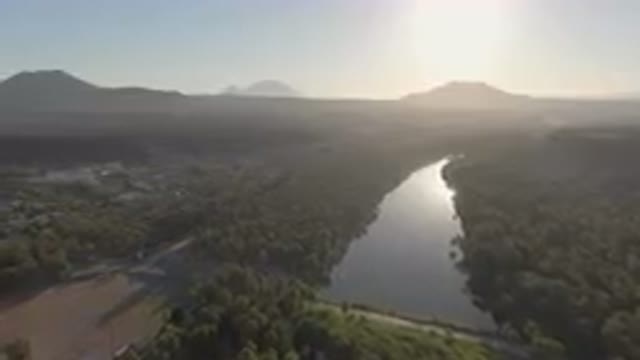 SAN IGNACIO BCS MEXICO-2023: River Running Through A Lush Green Valley