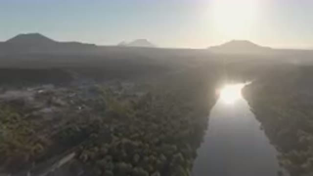 SAN IGNACIO BCS MEXICO-2023: River Running Through A Valley With A Mountain In