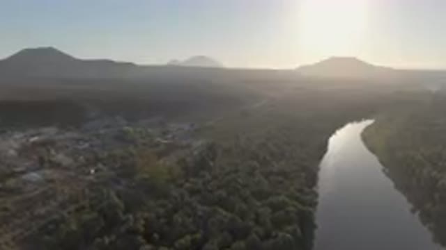 SAN IGNACIO BCS MEXICO-2023: River Running Through A Valley With A Mountain In