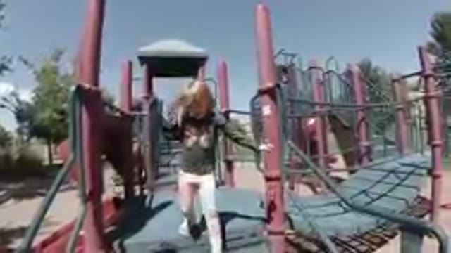 Little Girl Exiting A Playhouse