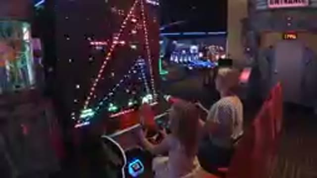 Mother & Daughter Playing Galaga