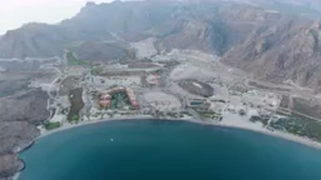 DANZANTE BAY LORETO BCS MEXICO-2023: Aerial View of Large Body of Water With Mountain