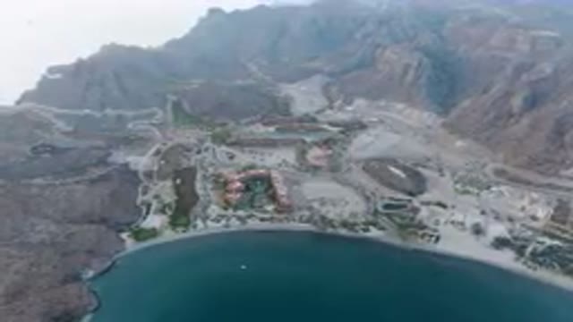 DANZANTE BAY LORETO BCS MEXICO-2023: Aerial Large Body Of Water Surrounded By Mountains And Greenery